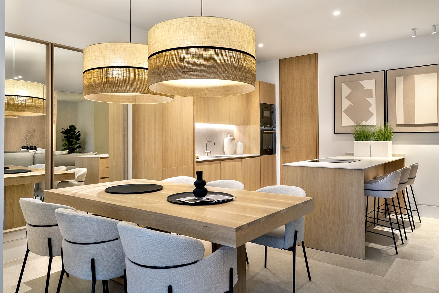 Dining area with natural-fibre pendants