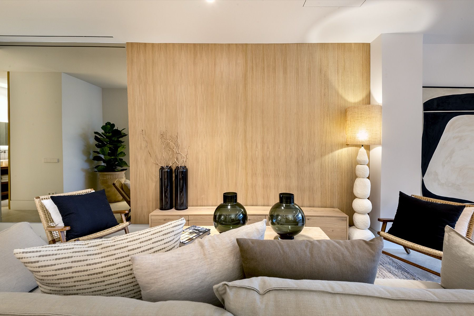 Living area with oak wall and reading lamp