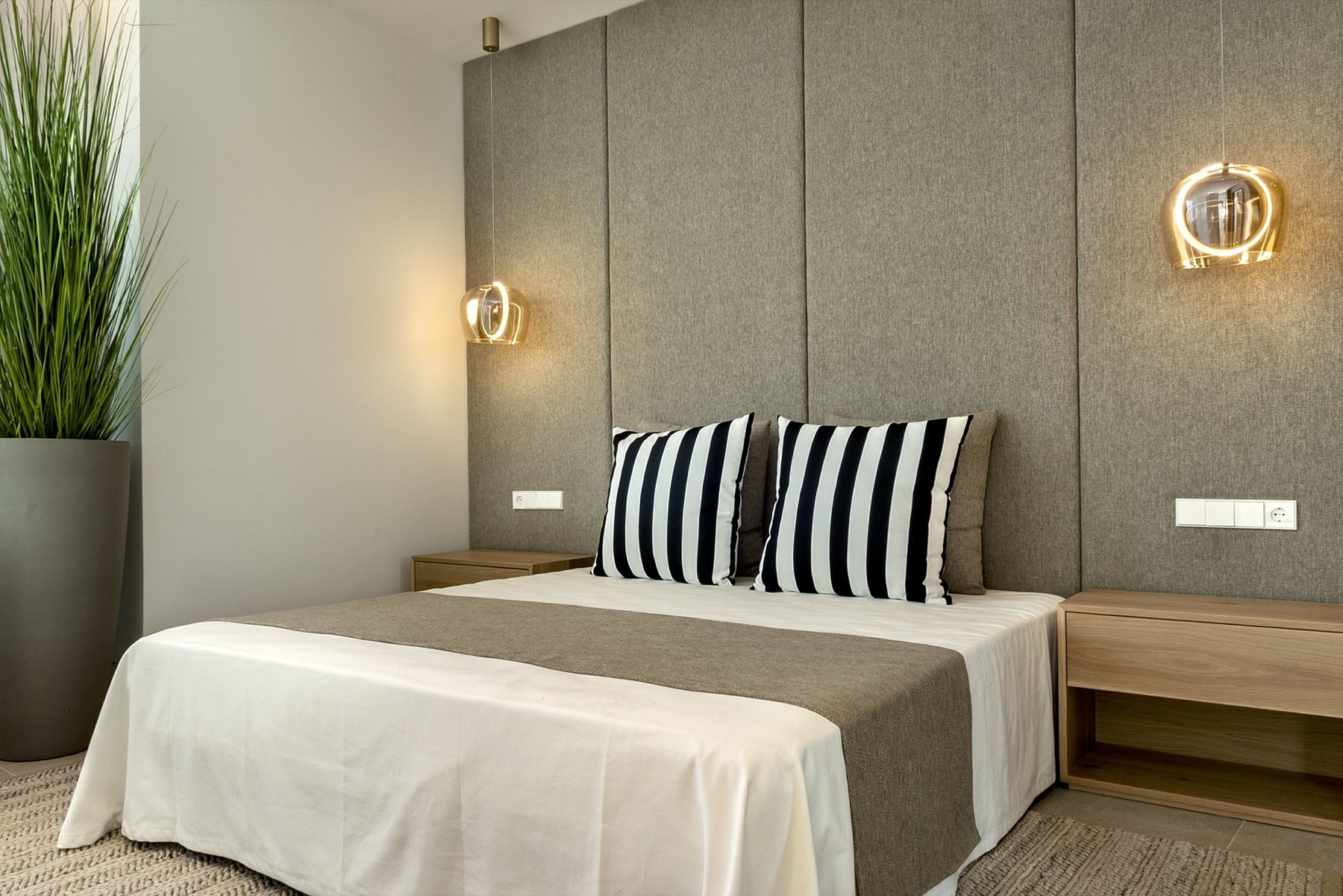 Bedroom with textile wall panel